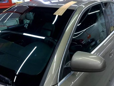 Тонирование двух задних стекол 5%, двух передних атермальной, и замена лобового стекла с тонировкой атермальной плёнкой Audi A4