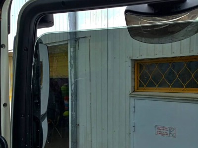 Тонирование передних отпускных стекол 15% пленкой SUNCONTROL на автомобиле MAN