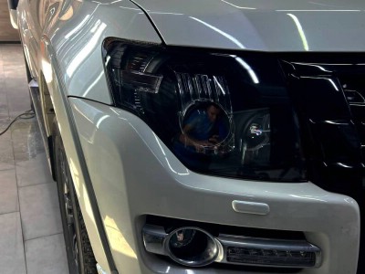 Тонирование задней полусферы 05% + защита передней оптики полиуретановой пленкой Mitsubishi Pajero