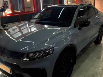 Тонирование задней полусферы 5% и бронирование фар полиуретаном Geely Tugella