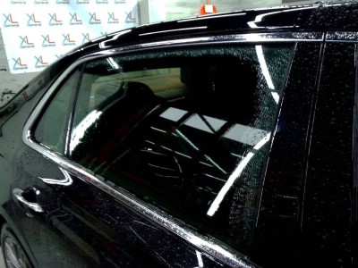 Тонирование задней полусферы на автомобиле KIA GENESIS пленкой SUNCONTROL 5%